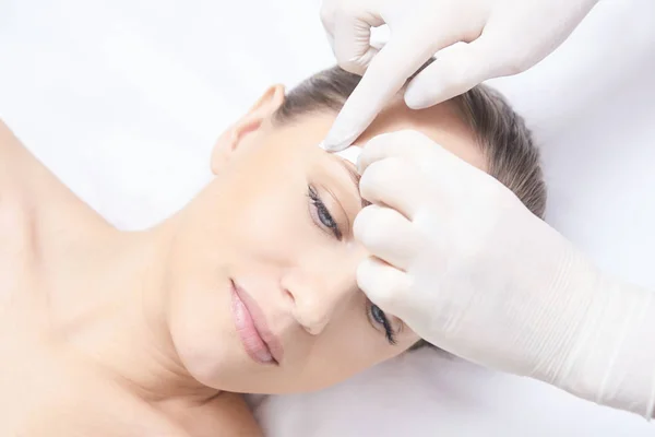 Waxing woman body. Sugar hair removal. laser service epilation. Salon wax beautician procedure.
