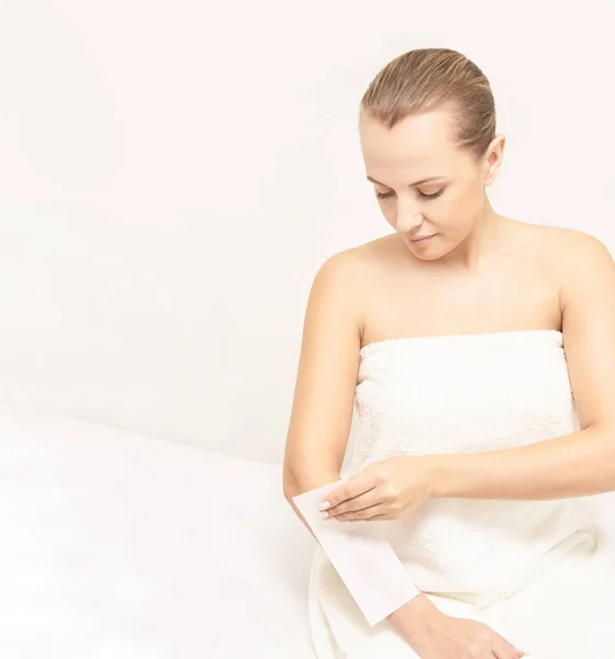 Unwanted hair wax epilation. Young Woman. cosmetology salon treatment procedure. Home waxing. — Stock Image Unwanted Hair Wax Epilation Young Woman Cosmetology Salon Treatment Procedure Stock Image