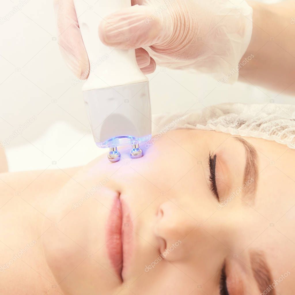 Light therapy procedure. Heal beauty treatment. Woman facial device. Anti age and wrinkle.