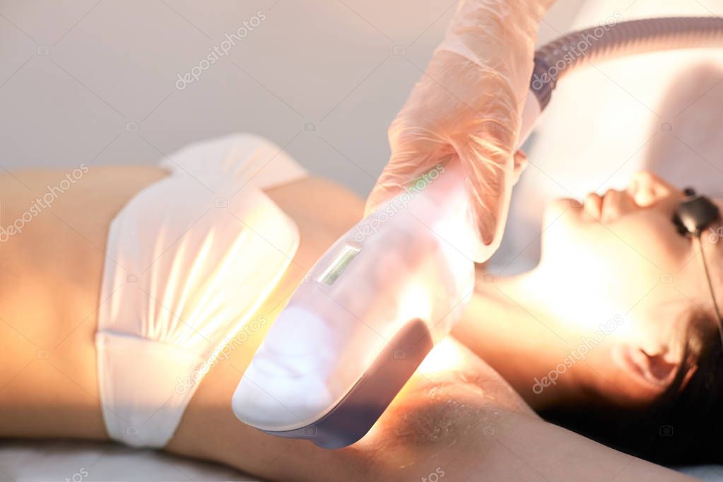 Hair laser removal service. IPL cosmetology device. Professional apparatus. Woman soft skin care.armpit
