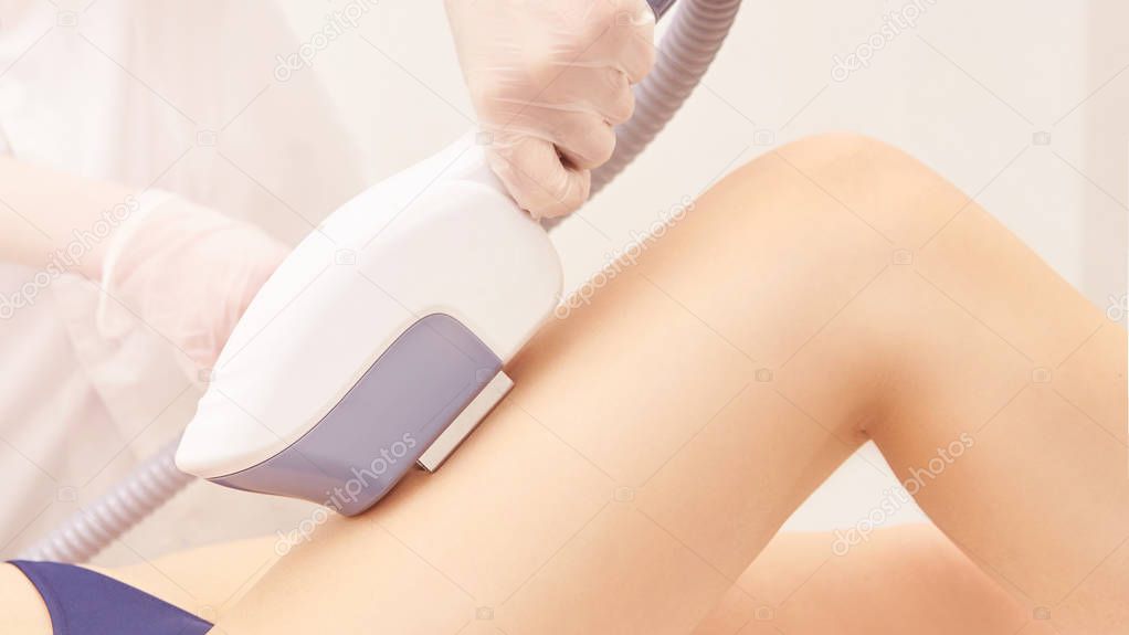 Hair laser removal service. IPL cosmetology device. Professional apparatus. Woman soft skin care.leg