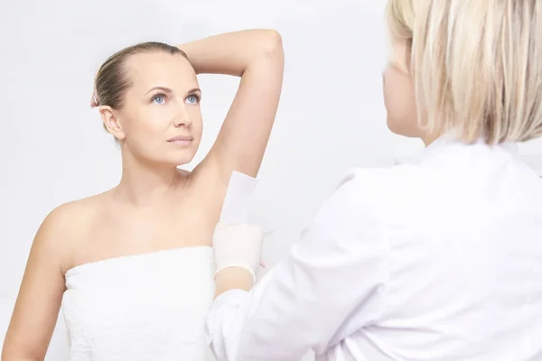 Unwanted hair wax epilation. Young Woman. cosmetology salon treatment procedure. Home waxing — Stock Image Unwanted Hair Wax Epilation Young Woman Cosmetology Salon Treatment Procedure Stock Image
