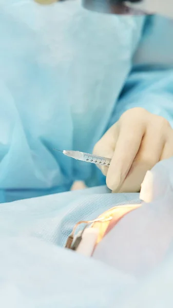 Ophthalmology laser microscope operation. Doctor in clinic. Patient eye treatment. Myopia and cataract removal — Stock Photo, Image