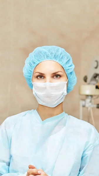 Pretty doctor woman portrait. Ophthalmology laser microscope operation. Clinic room. Patient eye treatment. Myopia and cataract removal — Stock Photo, Image