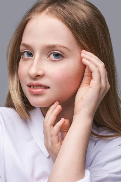 Beauty girl portrait. Young woman. Hand near nead. Face massage concept — Stock Photo, Image