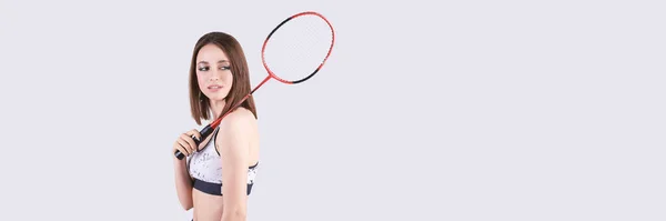 Schoonheid sport meisje. Mooie jonge vrouw in fitnesskleding. Slank lichaam. Badminton — Stockfoto