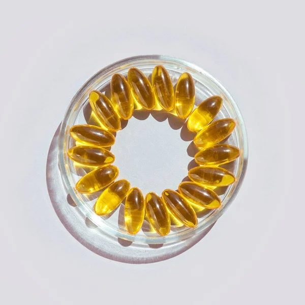 Omega3 gel capsule. Yellow vitamin. Dietology drug. Fish oil supplement — Stock Photo, Image