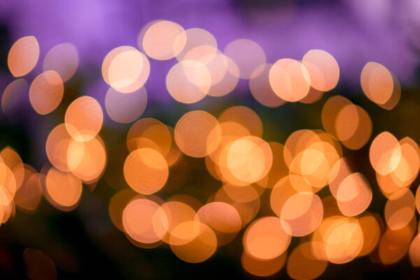 Beautiful circle bokeh lights on a dark background with various colors