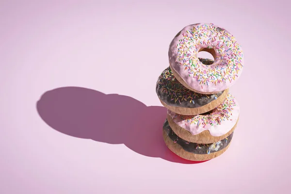 pink and chocolate glazed donuts with shadow on pastel background