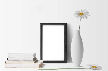 papatya çiçeği ve Kitaplar ile boş çerçeve 