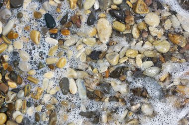 Sea pebbles and water. 