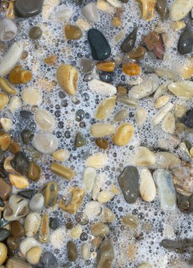 Sea pebbles and water. 