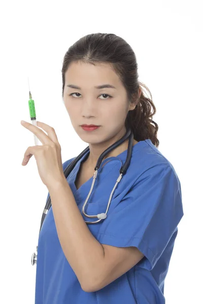 Evil Asian Doctor Nurse Holding Syringe Filled Green Medication Isolated — Stock Photo, Image