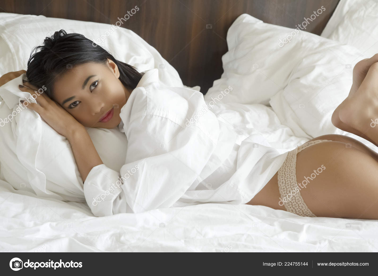 Beautiful Asian Woman Posing Wearing Shite Shirt Thong Panties Bed Stock  Photo by ©dndavis 224755144