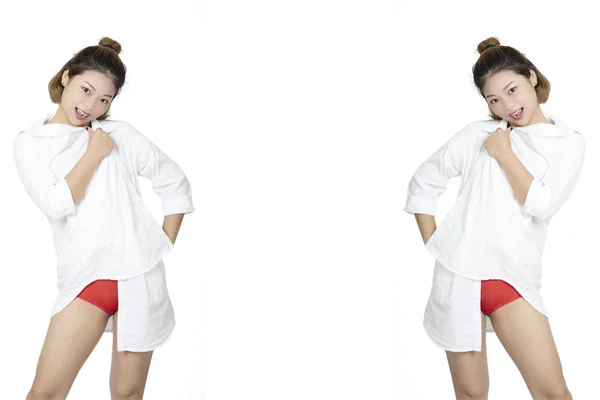 美丽的中国妇女摆姿势在白衬衫和一对红色内裤和胸罩查出在白色背景 — 图库照片