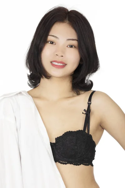 Chinese vrouw gekleed in blauwe thong geïsoleerd op witte achtergrond — Stockfoto