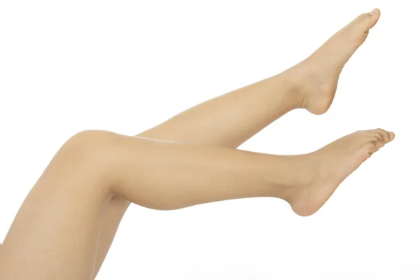 Les belles jambes sexy de la femme isolées sur fond blanc — Photo