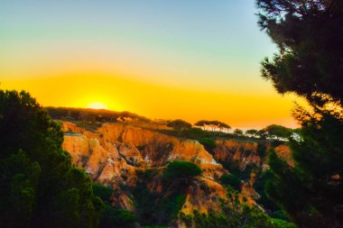 Sunrise, Portekiz Algarve sahilinde günbatımı. Lagos, Faro, Albufeira