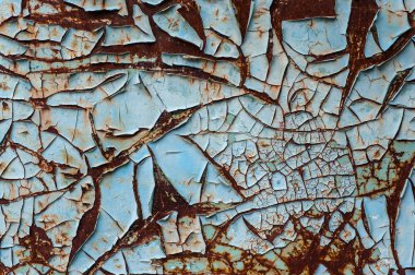 Paslı çelik üzerinde eski renkli boya