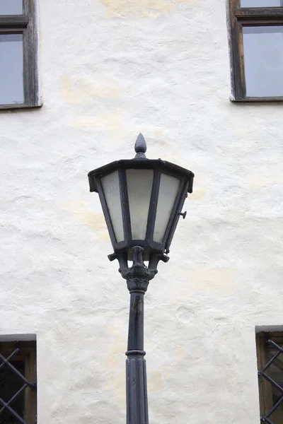 Photo of vintage Old Street Classic Iron Lantern On The House Wall, Close Up — Stock Photo, Image