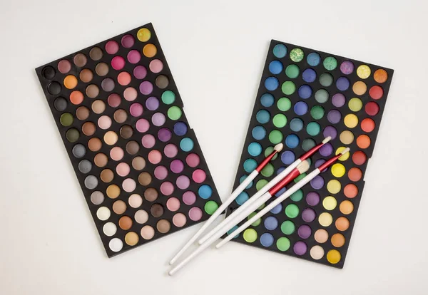 Colorful makeup set of eye shadows and brushes