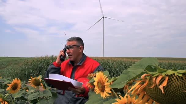 Engineer Wind Turbines Background Wind Farm Worker Using Radio Communication — Stock Video