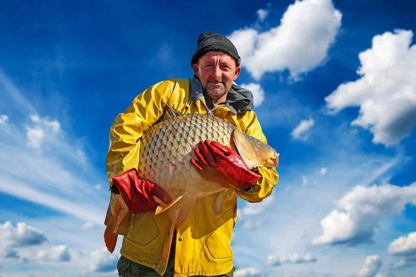 Portrait Smiling Fisherman Big Carp Fish His Hands — Stock Photo, Image