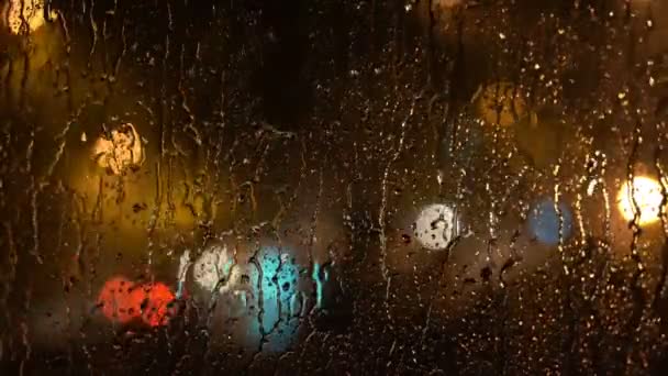 City Lights Traffic Rainy Night Rack Focus Raindrops Glass Window — Stock Video