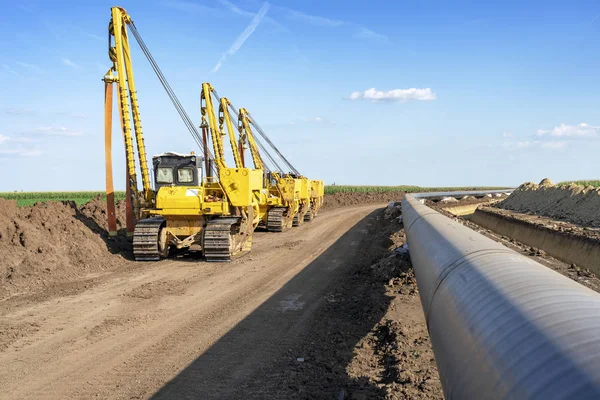 Ağır makine ve gaz boru hattı inşaat alanı — Stok fotoğraf