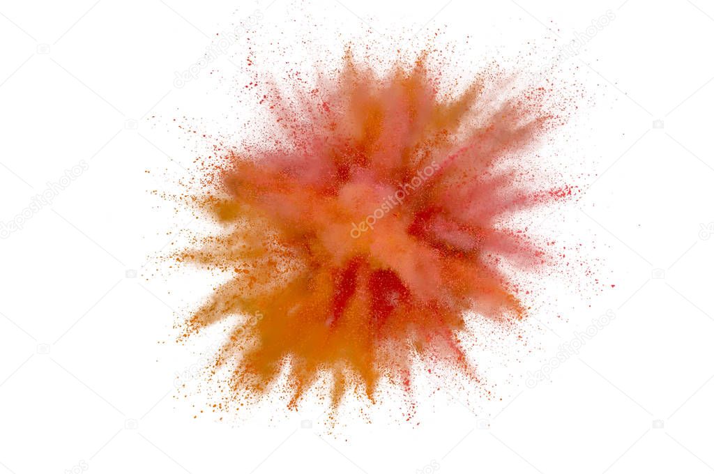 Colored powder explosion on white background. Abstract closeup d