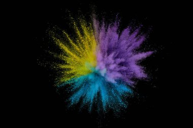 Renkli toz patlaması. Arka planda soyut çekim tozu. Albay