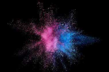 Renkli toz patlaması. Arka planda soyut çekim tozu. Albay
