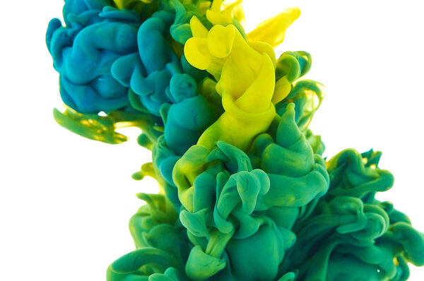 Ink in water. Splash paint mixing. Multicolored liquid dye. Abst