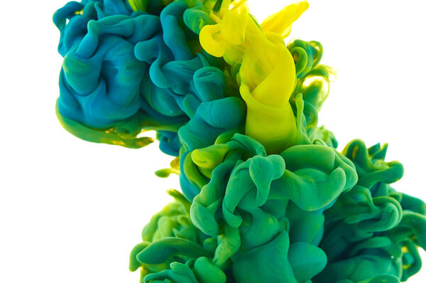 Ink in water. Splash paint mixing. Multicolored liquid dye. Abst