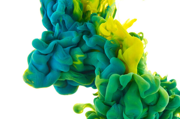 Ink in water. Splash paint mixing. Multicolored liquid dye. Abst