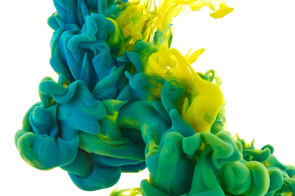 Ink in water. Splash paint mixing. Multicolored liquid dye. Abst