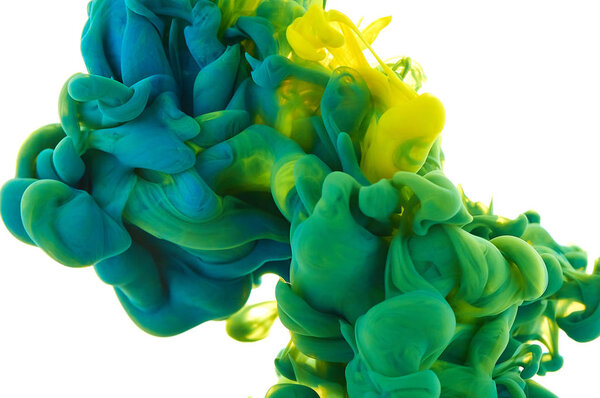 Ink in water. Splash paint mixing. Multicolored liquid dye. Abst