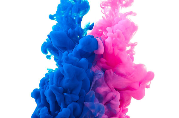 Ink in water. Splash paint mixing. Multicolored liquid dye. Abst