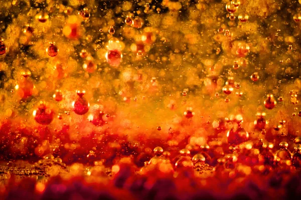 Bubblor i flytande färgglad abstrakt Stockbild