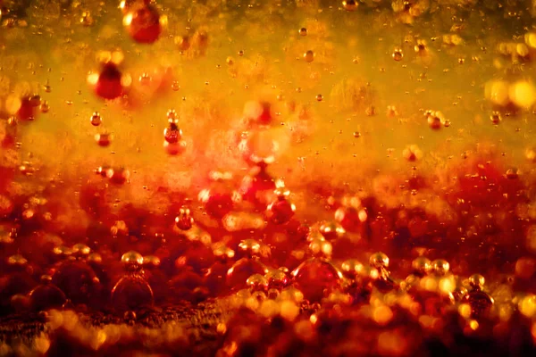 Бульбашки в рідкому барвистому абстрактному Ліцензійні Стокові Фото