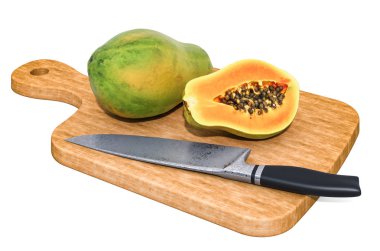 Papaya, tahta bir tahtanın üzerinde, bir bıçağın yanında yatıyor.