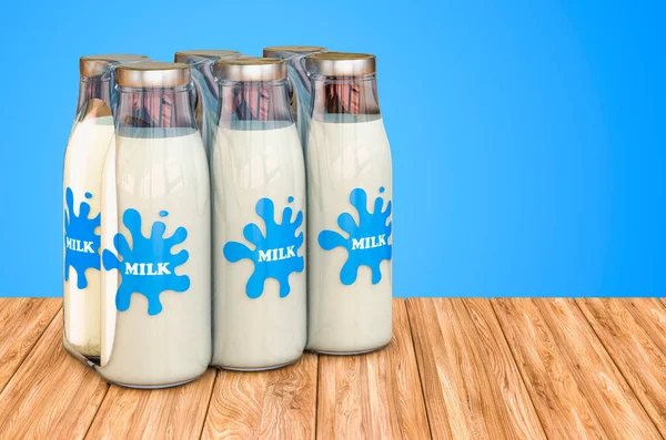 Paket Botol Susu Kaca Dalam Film Menyusut Atas Meja Kayu — Stok Foto