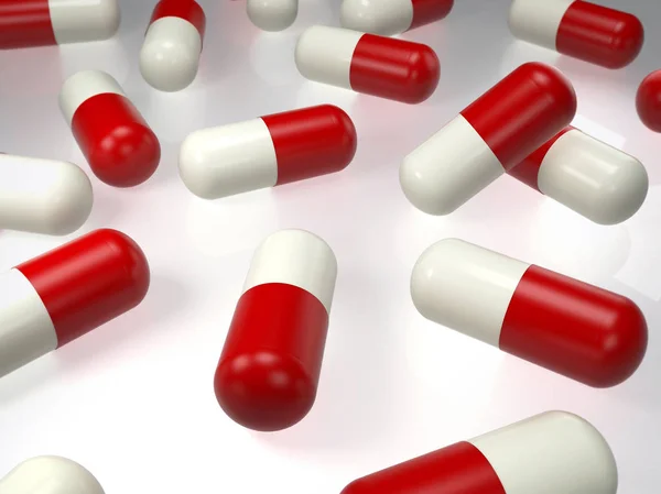 Tablo üzerinde tıbbi hapları kırmızı/beyaz