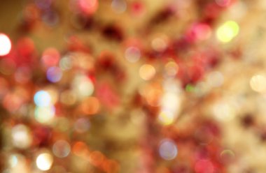 Bokeh odaklı ışıklarla altın soyut arkaplan