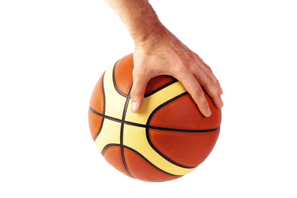 The isolated image of a hand and basketball ball on a white background