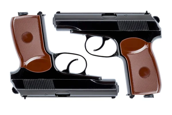 Два пистолета симметрично направлены вниз по стволам. — стоковое фото
