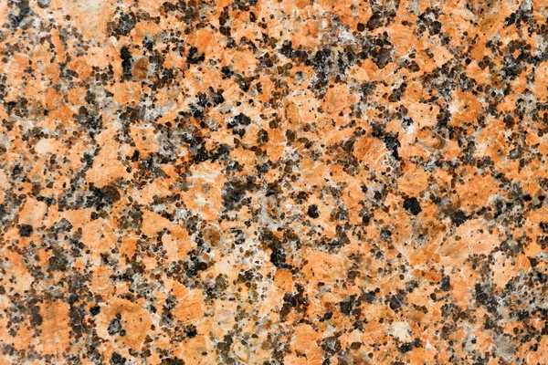 Red granite slab texture as a graphic pattern