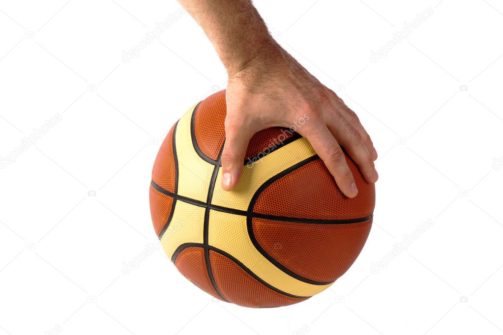 Hand reaching for a basketball on a white background