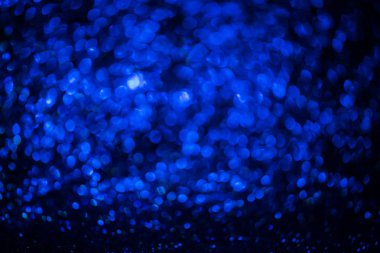 Bokeh sim Renkli Bulanık soyut arkaplan doğum günü, yıldönümü, düğün, yeni yıl arifesi ya da Noel için.