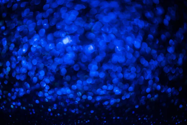 Bokeh sim Renkli Bulanık soyut arkaplan doğum günü, yıldönümü, düğün, yeni yıl arifesi ya da Noel için.